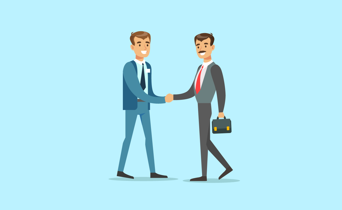 Businessman shaking hands with lender.