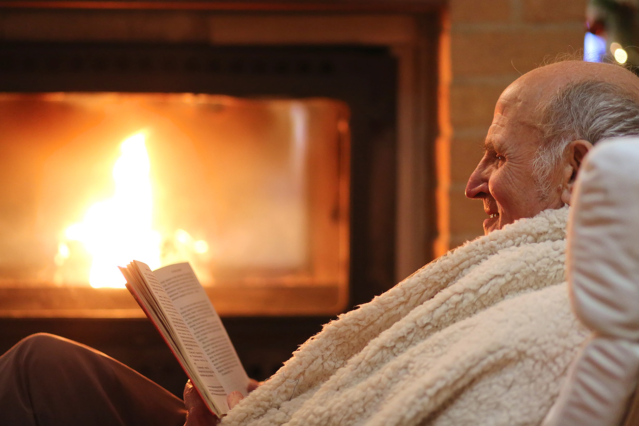 Grandfather Reading at Home.