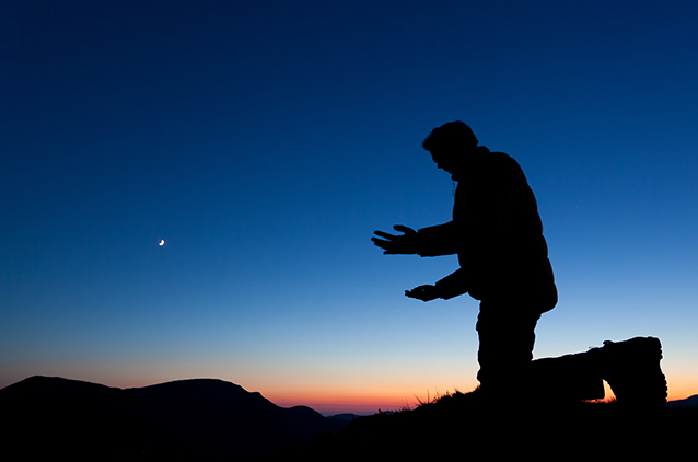 Man Praying at Dusk.