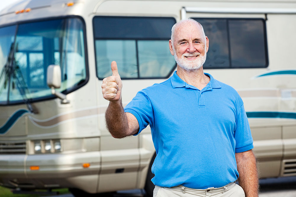 Man with an RV giving thumbs up.