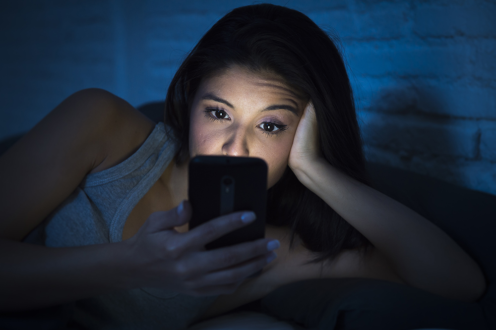 Woman Scanning Cell Phone.